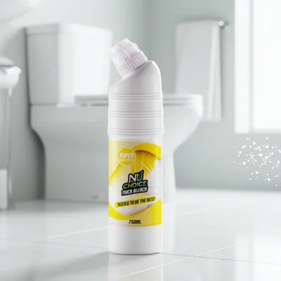 NuChoice Thick Bleach 750ml bottle in a clean bathroom setting, featuring a white plastic bottle with yellow label and "Super Germ Killer" branding, placed on tiled floor with toilet in background.